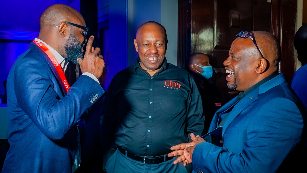 dx5 co-founders Harry Hare (right), with Andrew Karanja (centre) engaging with a delegate at the 12th edition of the Cloud and Security Summit in 2022