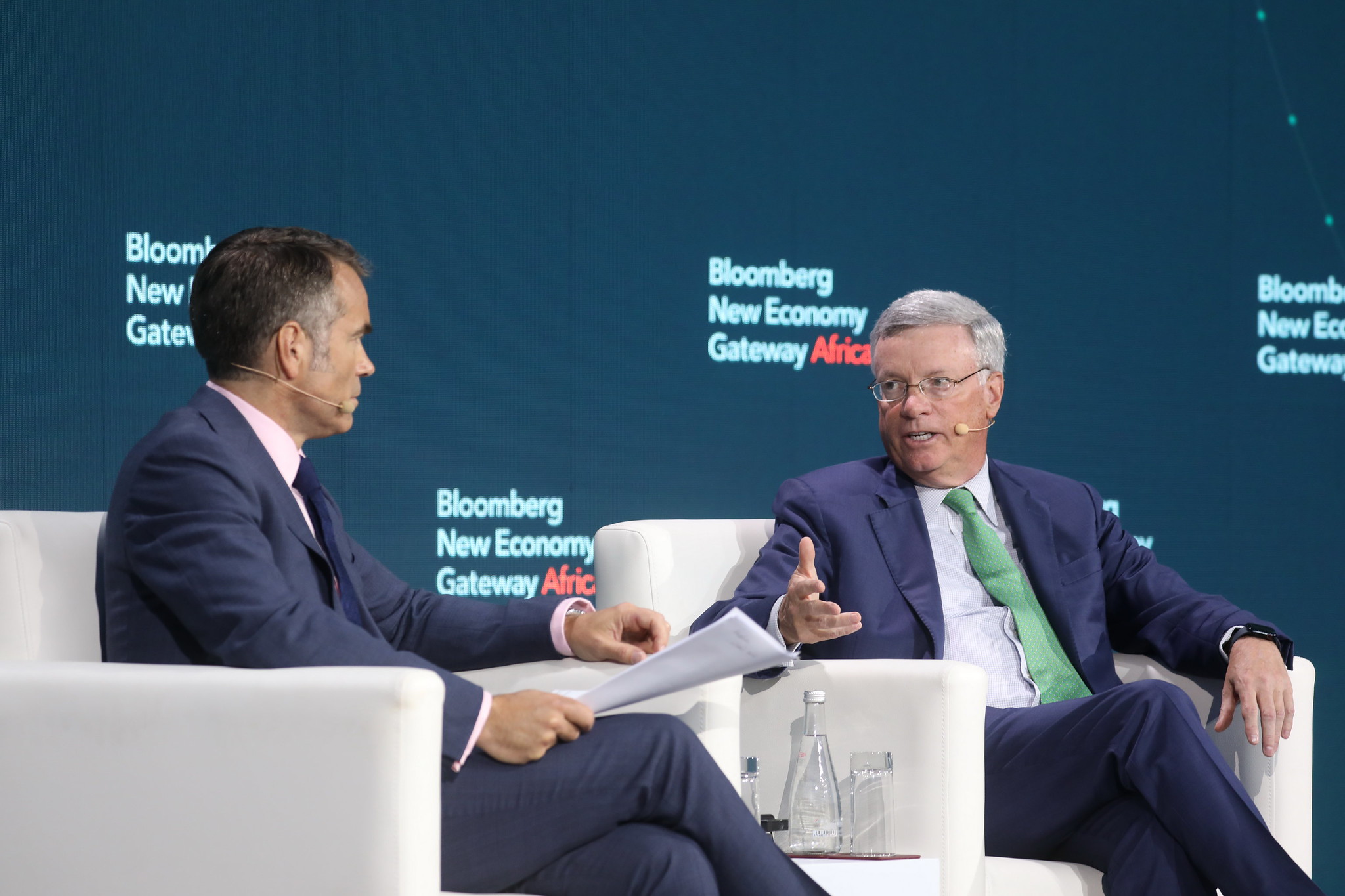 Visa Executive Chairman Alfred F. Kelly Jr. (right) speaking at the Bloomberg New Economy Gateway Africa conference in Marrakech, Morocco