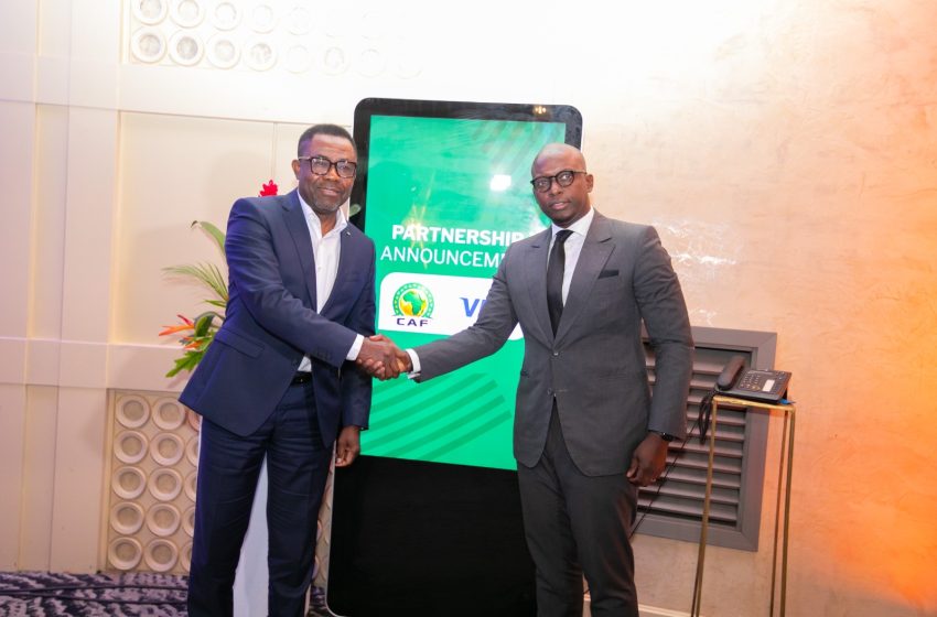 Ismahill Diaby, Vice President, Cluster Country Manager, Visa Western and Central Africa (Right) and Véron Mosengo-Omba, General Secretary of Confederation of African Football (CAF) during the signing ceremony in Abidjan