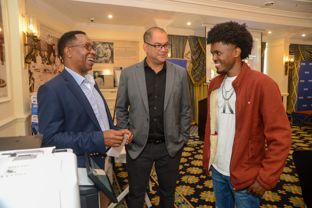(L-R) Centre for Mathematics,Science and technology Education In Africa Martin Mungai, Epson Regional Head East for East and West Africa Mukesh Bector and CEO vision Drill kenya Ian Muthomi
