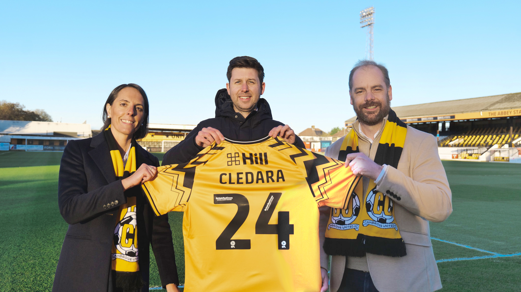 Brad van Leeuwen, Cledara co-founder and COO (left); Alex Tunbridge, Cambridge United CEO (centre), and Cristina Vila Vives, Cledara founder and CEO.